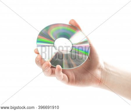 Hand Holding A Cd. Close Up. Isolated On A White Background.