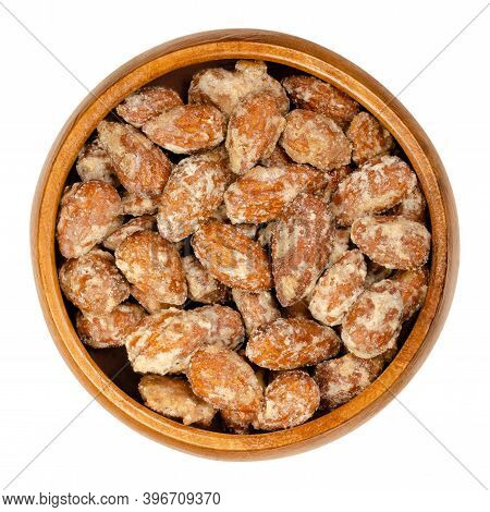 Candied Almonds In A Wooden Bowl. Homemade, In A Special Way Cooked Almonds, Whole Nuts Coated In Cr