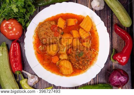 Tasty Chirpan Style Meatballs, In A Plate On A Wooden Table, Top View