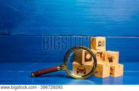Cardboard Boxes And Magnifying Glass. Monitoring And Verification Of Goods, Import Certification. Qu