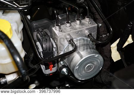 Control Unit And Anti-lock Brake System Module Installed In A Modern Car.