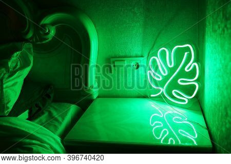 Neon Sign Monstera In The Decor Of The Kitchen. Trendy Style. Neon Sign. Custom Neon. Home Decor.