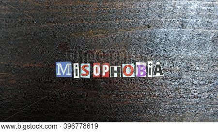 Misophobia  Word From Paper Letters On A Wooden Surface, Fear Of Viruses
