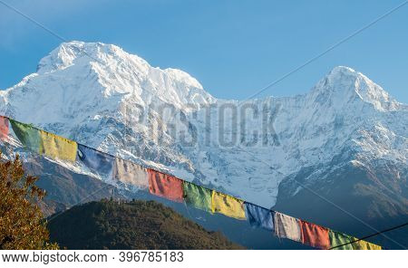Beautiful Landscape Of Annapurna Range Includes Mt.annapurna South And Mt.hiunchuli With Tibetan Fla