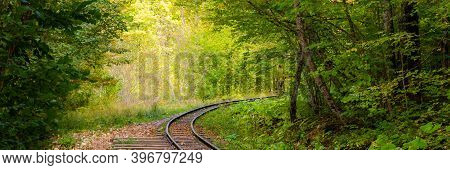 Abandoned Railway In Autumn Mountain Forest With Foliar Trees In Caucasus, Mezmay.