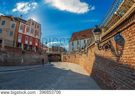 Sibiu, Romania - July 8, 2020: View To The Bridge Of Lies, The First Cast Iron Bridge Built In Roman