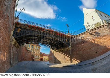 Sibiu, Romania - July 8, 2020: View To The Bridge Of Lies, The First Cast Iron Bridge Built In Roman