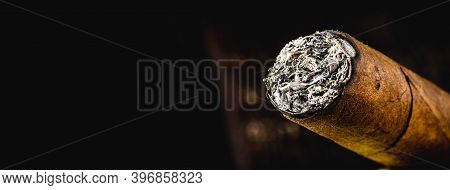 Cigar Tip Detail, Isolated On Dark Background