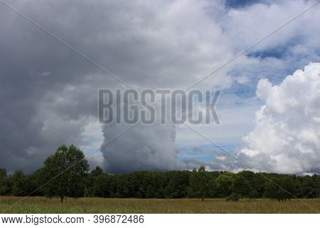 Cumulonimbus Calvus - Rain Cloud That Stretches Vertically Upwards But Has Not Yet Reached Its Heigh