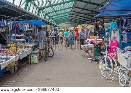 Novi Sad, Serbia - June 2, 2018: People Shopping At Indoor Hall Flea Market In Novi Sad, Serbia.