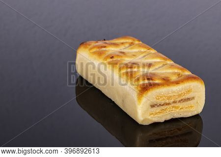 A (pan De Cadiz) Typical Sweet From Andalusia, Spain. Baked Dessert Of Marzipan Dough Filled With Ca