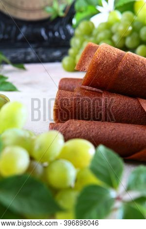 Natural Light Grape Marshmallow Is Rolled Into A Tube. Natural Bioproduct Without Preservatives. Vin