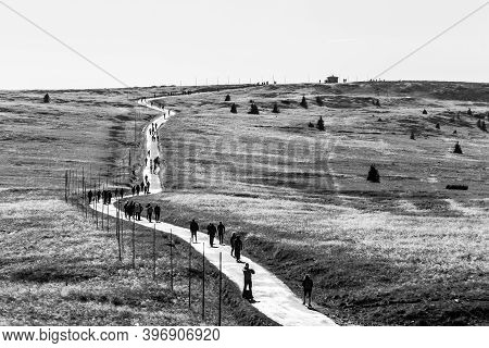 Giant Mountains - October 12, 2019: Tourists Hiking In Giant Mountains, Czech: Krkonose. Czech Repub