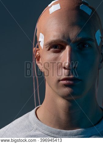 Man With Electrodes In His Head Is A Futuristic Concept Of Virtual Reality And Mind Control. Neuro I