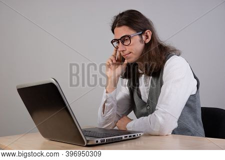 Geek Guy Is Trying To Write Code Or Learn A New Programming Language, Experience Difficulties In The