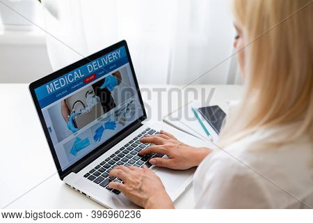 Woman Choosing Medication Online Pharmac. Purchase Of Drugs And Medicine Online.