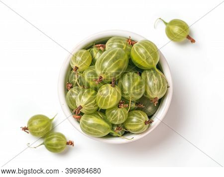 View From Above Of Ripe Green Gooseberry In Small Bowl On White Background. Organic Gooseberries Iso