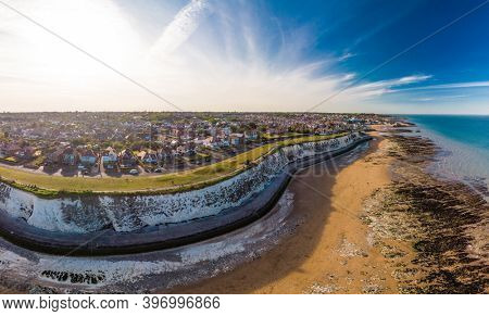 Drone aerial view of the beach and white cliffs on sunny day, Margate, England, UK