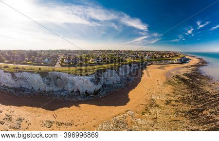 Drone aerial view of the beach and white cliffs on sunny day, Margate, England, UK