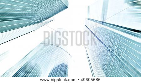 Panoramic and perspective wide angle view to steel blue background of glass high rise building skyscrapers in modern futuristic downtown over sky Business concept of successful industrial architecture