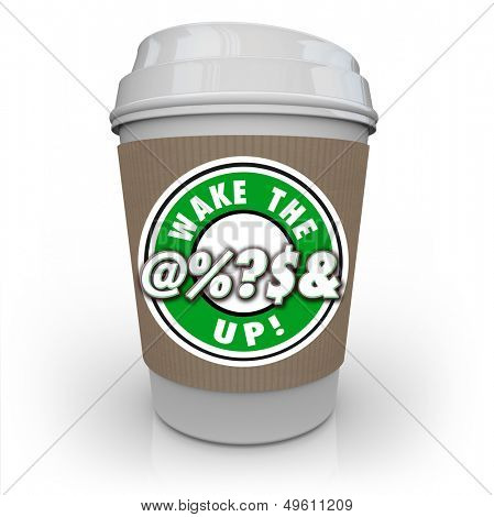 The words Wake the Hell Up on a cup of coffee to illustrate becoming alert, conscious and awake to problems and issues around you