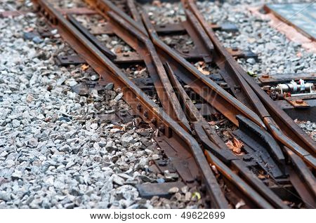 Old railway tracks and inter twining together and crossing over each other