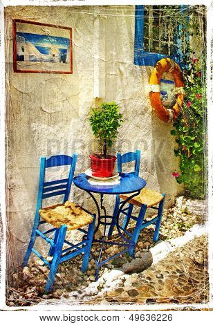 traditional Greece - old chairs in taverna- retro styled picture
