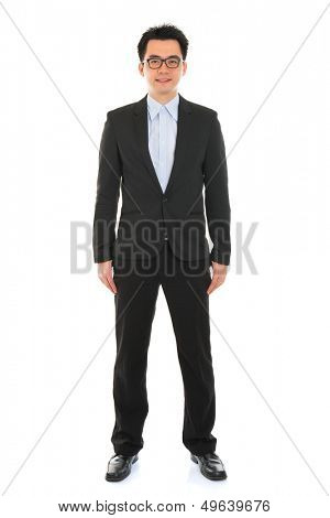 Confident full body Asian business man in formal full suit standing isolated on white background