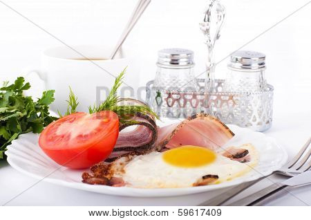 Fried eggs on a frying pan with olive oil