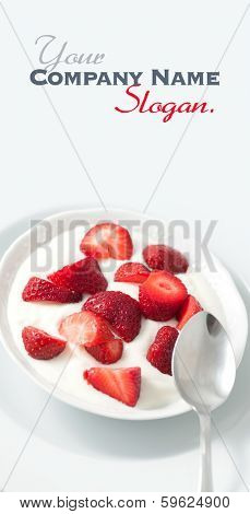 Porcelain bowl with strawberries and cream yogourt