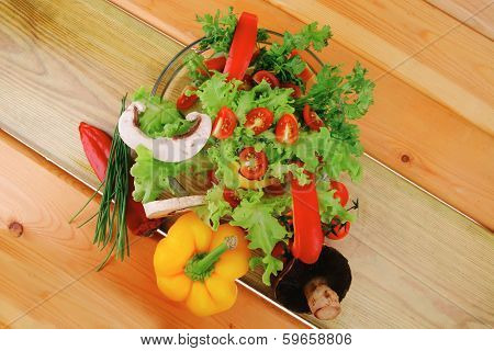 image of vegetables in salad on wood