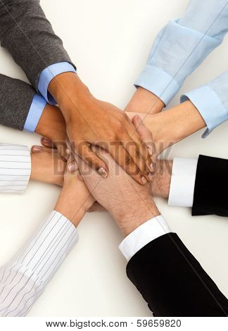 business, succcess and winning concept - group of businesspeople celebrating victory