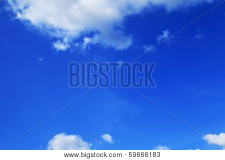 Blue Sky Background With Tiny Clouds
