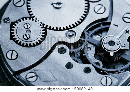 Clockwork details, pinions and wheels closeup