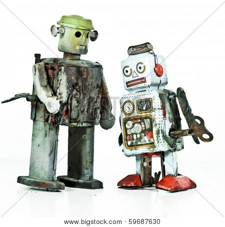  two burnt robot toys