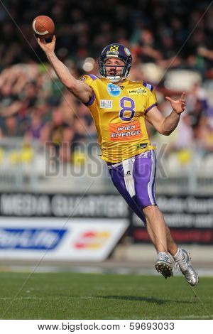 VIENNA,  AUSTRIA - APRIL 21 QB Christoph Gross (#8 Vikings) throws the ball during the AFL football game on April 21, 2013 in Vienna, Austria.
