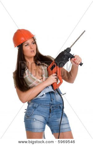 Woman in orange helmet holding hammer drill