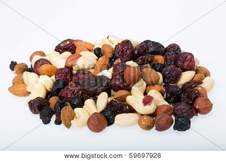 mixed nuts and dried fruits isolated on white background