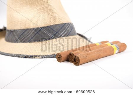 cuban cigar and hat