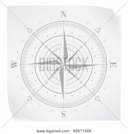 Compass rose over white paper sticker isolated on white
