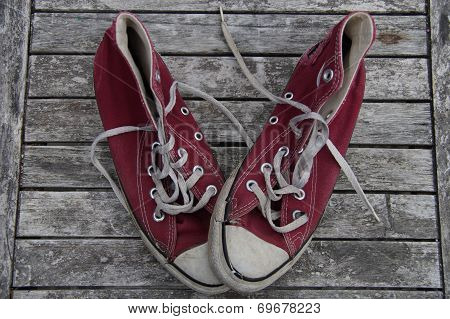 Old red canvas shoes