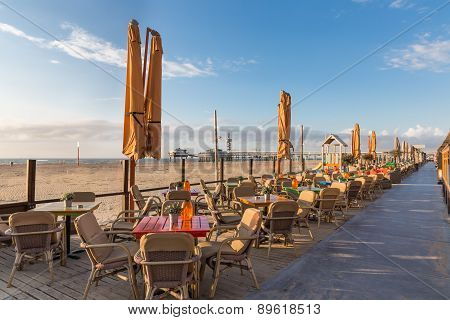 Terraces Along The Dutch Beach With A View At The Pier Of Scheveningen