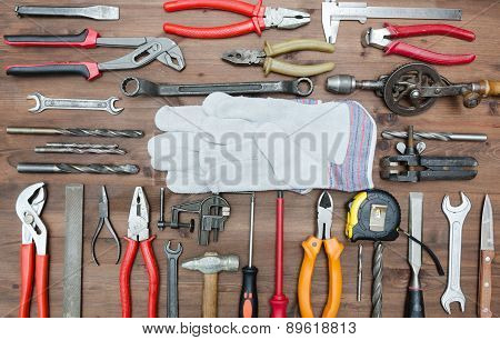 set of Different tools on wooden background