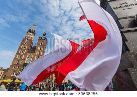 KRAKOW, POLAND - MAY 2, 2015: During Flag Day of the Republic of Polish - is national festival introduced by the Act of 20 Feb 2004. On the same day is celebrated Day of Polonia and Poles Abroad.