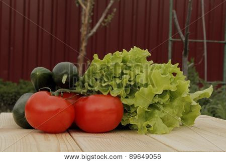 Mix of vegetables on wooden table