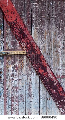 Picture of an Old wooden door with peeled paint