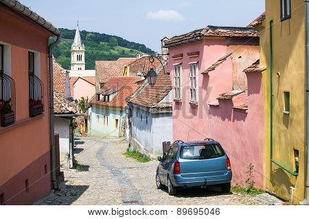 Old Paved Stone Street With Colored Houses From Old Turda