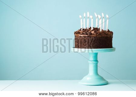 Chocolate birthday cake with candles