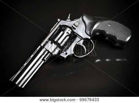 Revolver Gun On Black Background