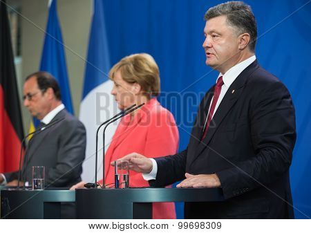 Francois Hollande, Angela Merkel And Petro Poroshenko